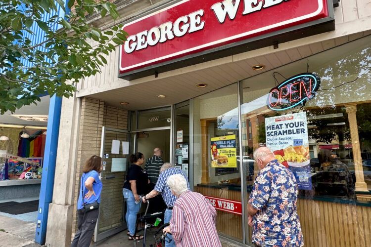 Brewers fans line up to grab free burgers